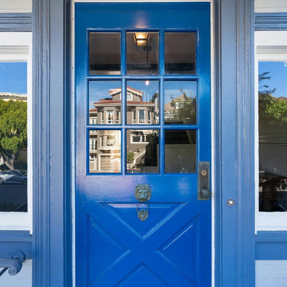 View of a bright blue front door