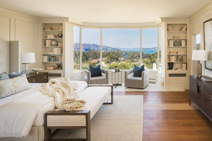 View of a bedroom with views of the San Francisco Bay