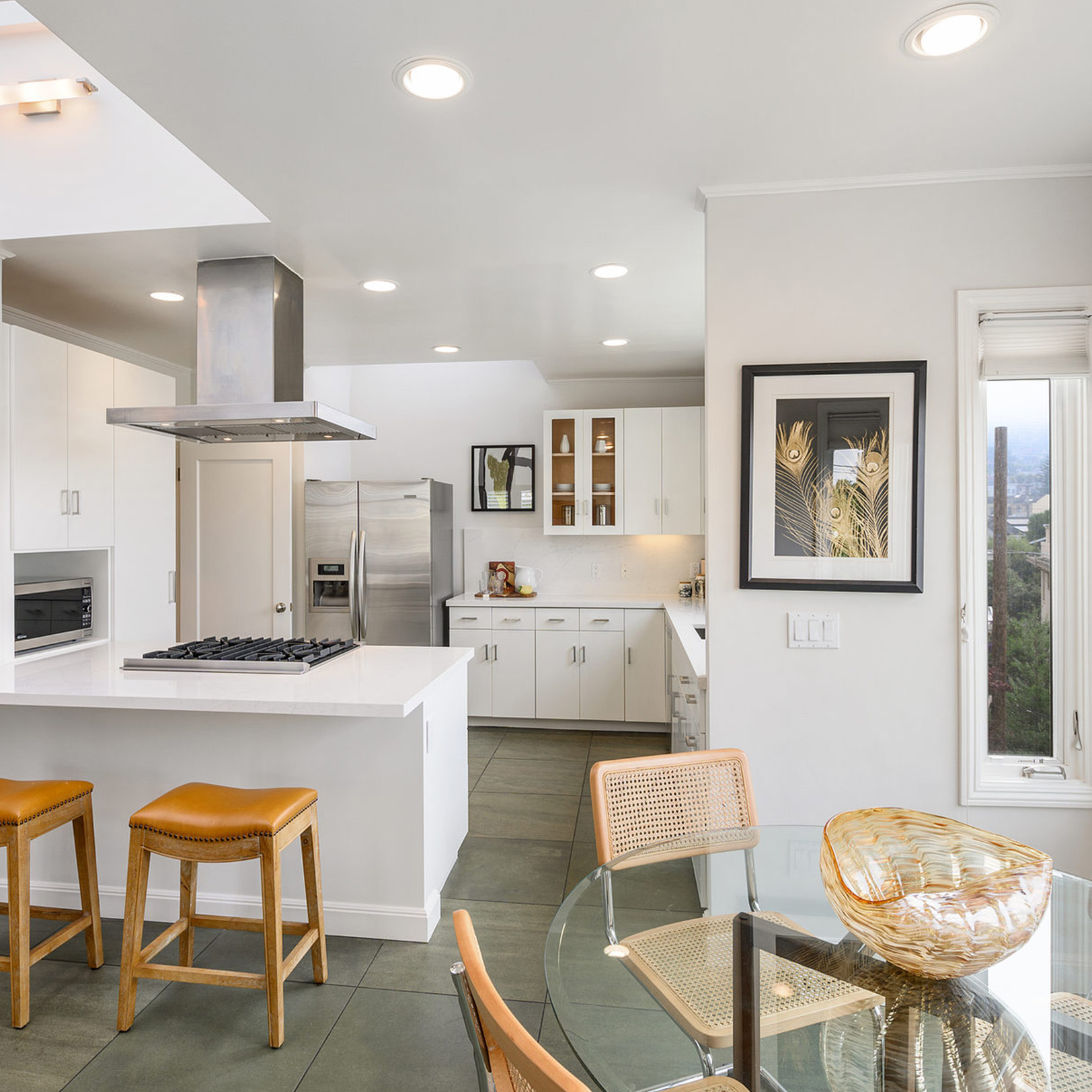 View of the kitchen at 2566 14th Ave, featuring white cabinets